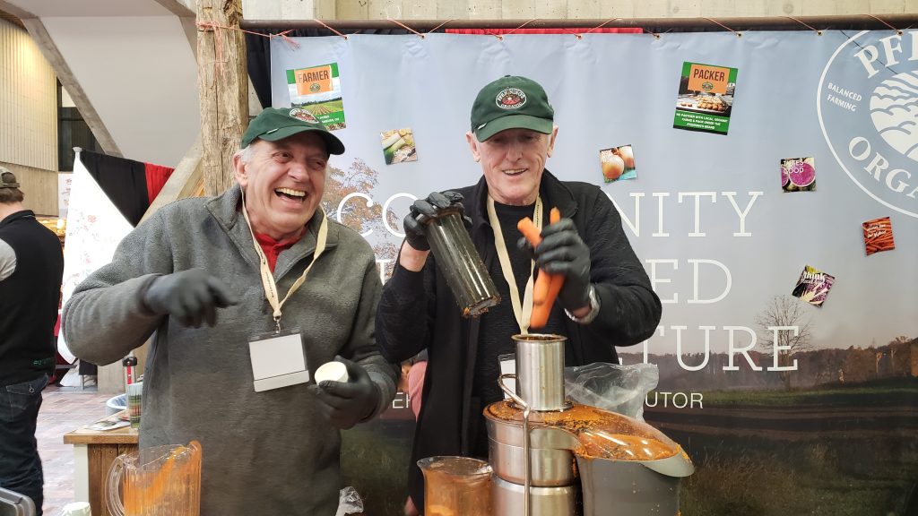 juicing carrots at the Guelph Organic Conference